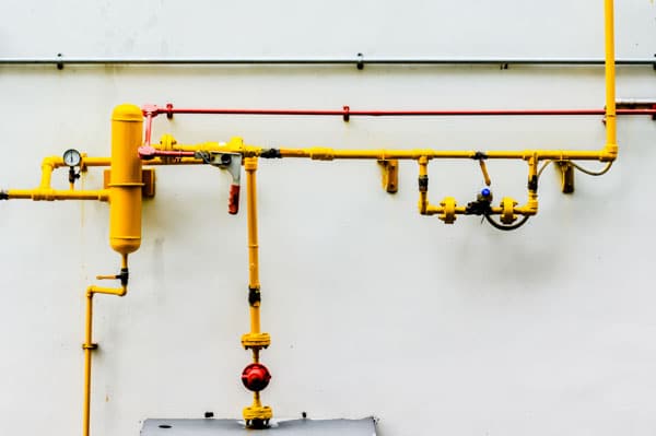 gas-line-repair-pipes-wall-valve-gauge