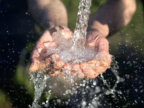 water-well-pump-repair-flowing-hands